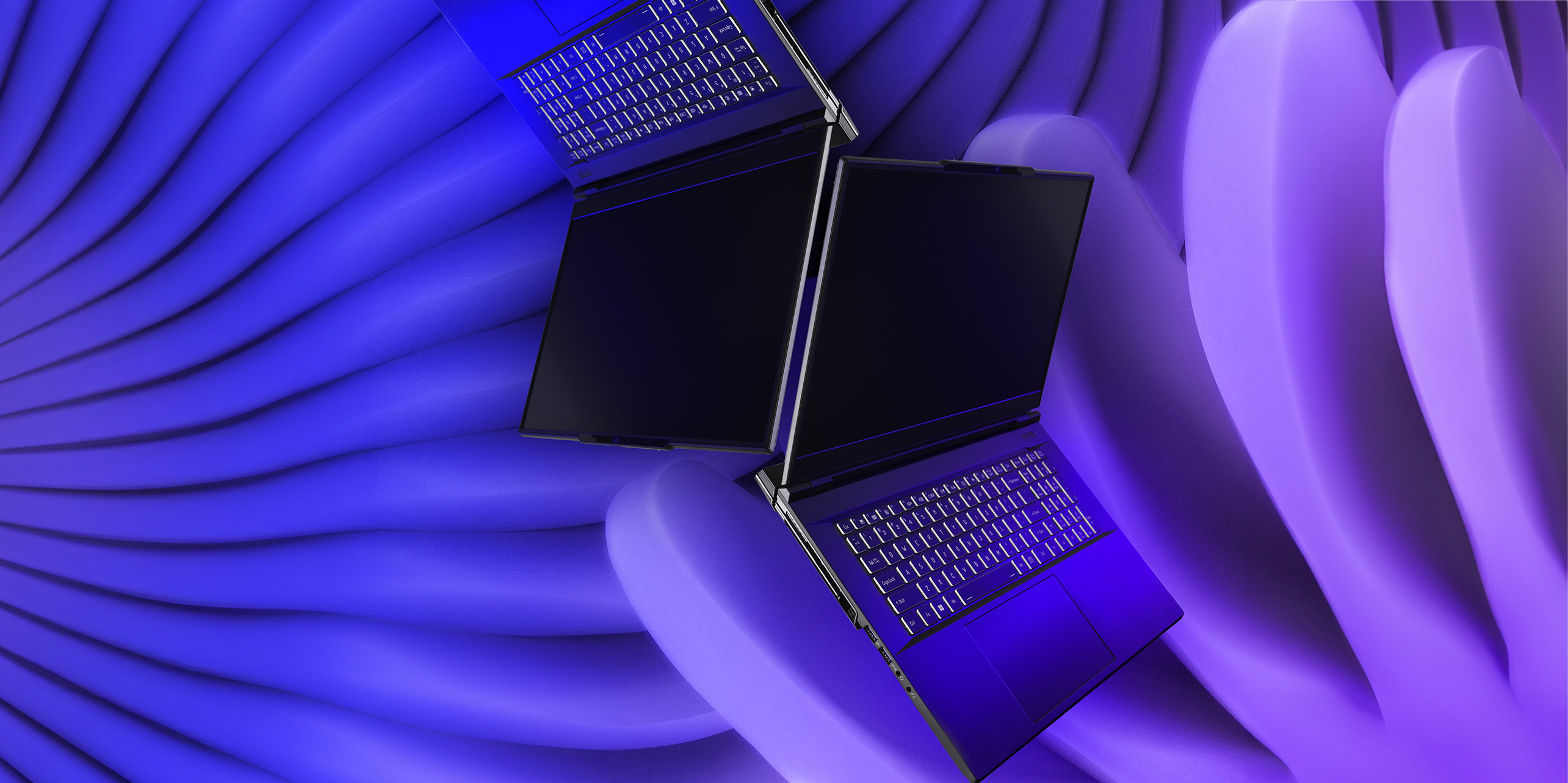 Velocity Micro Signature 17 Laptops on Abstract Violet Background